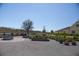Landscaped community garden featuring planting beds and a charming water feature at 8665 Theiler St, Orlando, FL 32827
