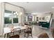 Open layout with a dining area, living room, and modern finishes at 8665 Theiler St, Orlando, FL 32827