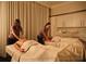 Couples massage at the on-site spa, featuring calming décor and expert therapists at 10160 Autumn Mist Ln # 601, Golden Oak, FL 32836