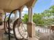 Charming balcony with hanging chairs, perfect for enjoying the outdoor views and natural light at 1110 W Ivanhoe Blvd # 15, Orlando, FL 32804