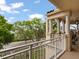 Spacious balcony with views of lush greenery and partial city views, offering outdoor relaxation at 1110 W Ivanhoe Blvd # 15, Orlando, FL 32804