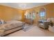 Bedroom featuring three arched windows, a modern light fixture and an accent wall at 1110 W Ivanhoe Blvd # 15, Orlando, FL 32804