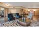 Expansive living room showcasing hardwood floors, upscale furnishings, and a sophisticated ambiance at 1110 W Ivanhoe Blvd # 15, Orlando, FL 32804