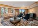 Bright living room featuring stylish furniture, hardwood floors, and an inviting, spacious layout at 1110 W Ivanhoe Blvd # 15, Orlando, FL 32804