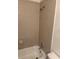 Shower area featuring neutral tile surround and updated fixtures at 11574 Westwood Blvd # 1126, Orlando, FL 32821