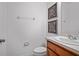 Neat half bath with updated vanity and fixtures, perfect for guests at 1230 Sand Torch Cir, Davenport, FL 33837