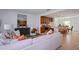 Spacious living room open to kitchen and dining areas providing ample space for entertaining at 1230 Sand Torch Cir, Davenport, FL 33837