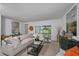 Cozy living room with comfortable seating, bright and airy interior, and stylish decor at 1230 Sand Torch Cir, Davenport, FL 33837