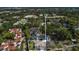 Aerial view of a residential area showcasing neatly arranged houses and lush greenery at 1251 Arlington Pl, Winter Park, FL 32789