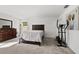 A light and airy bedroom with an exercise machine at 1328 Pompay Dr, Davenport, FL 33896