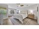 Bright bedroom with large window, ceiling fan, and sitting area at 1342 Benevolent St, Maitland, FL 32751