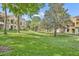Beautiful community green space with lush lawn, sidewalks, mature trees, and well-maintained landscaping at 1342 Benevolent St, Maitland, FL 32751