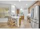 Well-lit kitchen with stainless appliances, and counter seating at 1342 Benevolent St, Maitland, FL 32751