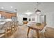 Open concept living room and dining room and views to kitchen at 1342 Benevolent St, Maitland, FL 32751