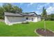 A well maintained backyard and modern exterior featuring a new home at 1365 Lake Dr, Casselberry, FL 32707