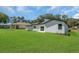Spacious backyard of a new home with well-maintained lawn at 1365 Lake Dr, Casselberry, FL 32707