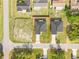 Aerial view showcasing the property's layout, including the house, yard, and surrounding neighborhood at 14953 Sw 38Th Cir, Ocala, FL 34473