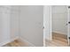 Walk-in closet featuring wire shelving and laminate flooring at 14953 Sw 38Th Cir, Ocala, FL 34473