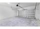 Spacious garage with concrete block walls and concrete flooring at 14953 Sw 38Th Cir, Ocala, FL 34473
