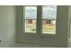 Bright bedroom with views of the outdoors at 15489 Hamlin Park Drive, Winter Garden, FL 34787
