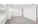 Bedroom featuring neutral carpet, white walls, and a window at 15489 Hamlin Park Drive, Winter Garden, FL 34787