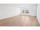 Spacious living room with hardwood floors and a view at 15489 Hamlin Park Drive, Winter Garden, FL 34787