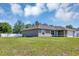 Beautiful home with a well-maintained lawn, traditional style, and a spacious yard perfect for outdoor activities at 1883 Sw 160Th Pl, Ocala, FL 34473