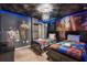 Star Wars-themed bedroom features themed decor, two beds, and a striking light fixture at 1970 Summer Dr, Davenport, FL 33897