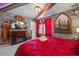 Themed bedroom with brick walls, red accents, and Harry Potter memorabilia offers a unique experience at 1970 Summer Dr, Davenport, FL 33897