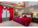 Themed bedroom featuring unique decor, an accent wall, and a comfortable sleeping area at 1970 Summer Dr, Davenport, FL 33897