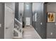 Spacious foyer featuring high ceilings, neutral paint, a staircase, and tile floors at 1970 Summer Dr, Davenport, FL 33897