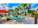 Relax in these hammocks on the sand under palm trees, a tropical escape awaits at this vacation resort at 1970 Summer Dr, Davenport, FL 33897