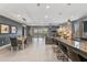 Spacious open-concept layout features a dining area, living room with recessed lighting, and sliding glass doors at 1970 Summer Dr, Davenport, FL 33897
