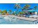 Inviting pool area with comfortable lounge chairs for sunny relaxation at 1970 Summer Dr, Davenport, FL 33897