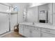 Well-lit bathroom featuring a glass enclosed shower and large vanity at 2142 Victoria Dr, Davenport, FL 33837