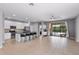 Bright, airy kitchen featuring stainless steel appliances and a breakfast bar with seating at 2142 Victoria Dr, Davenport, FL 33837