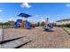 Community playground featuring multiple slides, climbing structures, and a soft, safe ground cover at 2142 Victoria Dr, Davenport, FL 33837