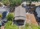 Aerial view of the property, highlighting the layout of the house, deck, and surrounding landscaping at 216 S Holly Ave, Sanford, FL 32771