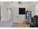 The bedroom features bamboo flooring and is equipped with a fan and modern fixtures at 216 S Holly Ave, Sanford, FL 32771