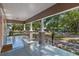 Inviting front porch with ample space, featuring classic columns and a relaxing atmosphere at 216 S Holly Ave, Sanford, FL 32771