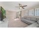 Spacious living room offers natural light, neutral tones, and ample seating for relaxation at 2211 Wadeview Loop, St Cloud, FL 34769