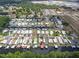 Wonderful aerial view of waterfront homes, boat docks, and beautiful waterways in an active community in Tavares, FL at 25931 Azalea Ln, Astatula, FL 34705