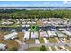 Bird's eye view of waterfront community, canal and docks; perfect for boating, fishing and enjoying the Florida lifestyle at 25931 Azalea Ln, Astatula, FL 34705