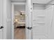 Ensuite bathroom with a walk-in shower, seamlessly connected to the bedroom for added convenience at 25931 Azalea Ln, Astatula, FL 34705