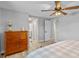 Light and airy bedroom with wood flooring and a ceiling fan at 25931 Azalea Ln, Astatula, FL 34705