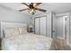 Bright bedroom with a large closet and light-colored floors at 25931 Azalea Ln, Astatula, FL 34705