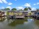 Waterfront home with a dock and boat lift at 25931 Azalea Ln, Astatula, FL 34705