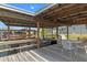 Boat under covered dock with table and chairs; an ideal waterfront oasis at 25931 Azalea Ln, Astatula, FL 34705