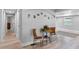 Hallway with recessed lights, wood-look floors, and neutral paint at 25931 Azalea Ln, Astatula, FL 34705