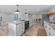 Open kitchen with a large island and modern appliances at 25931 Azalea Ln, Astatula, FL 34705